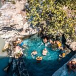 a group of people in a pool